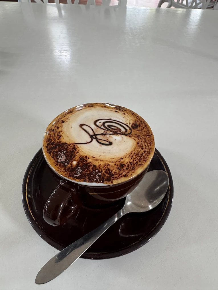 Signature Cafe Safavi mocha with chocolate latte art