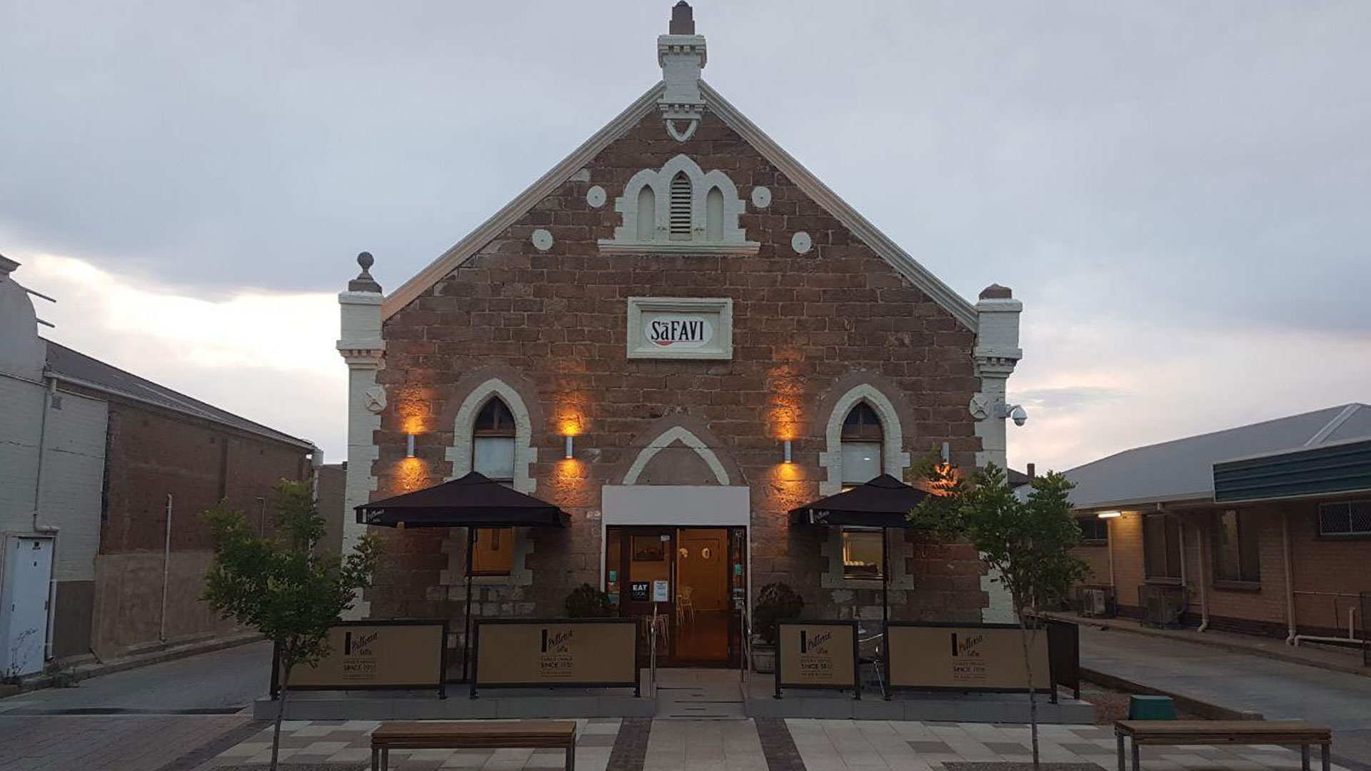 Cafe Safavi historic stone chapel exterior at dusk, Port Pirie
